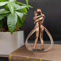 Decorative Embracing Figures Sculpture